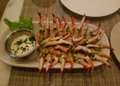 Highlands Bar and Grill signature dishes Crab Claws
Prime New York Strip
Grilled Pork Belly